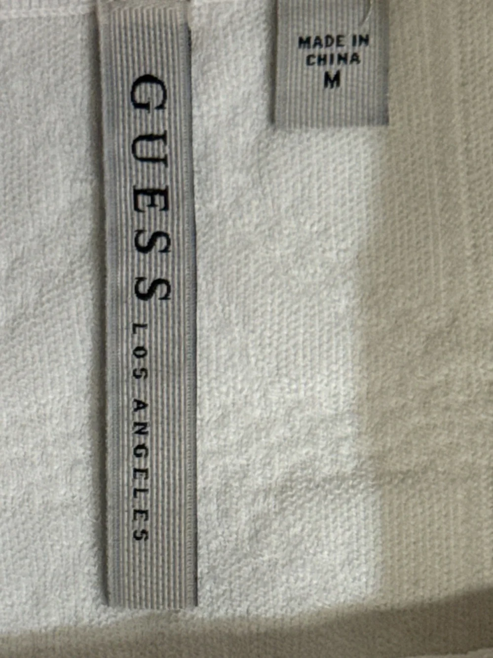 GUESS Los Angeles White Textured Mini Skirt Size M Elastic Waist Gold Logo - Picture 3 of 4